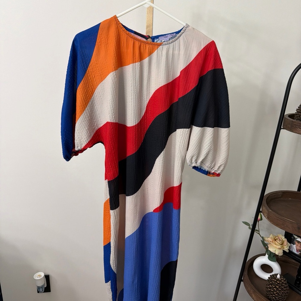 Vibrant Asymmetrical Dress with Bold Stripes